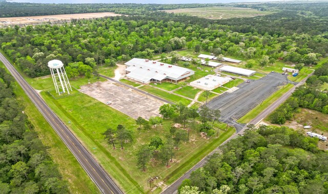 106 Kickapoo Dr, Anahuac, TX 77514 - drone / aerial view of a heavily wooded area