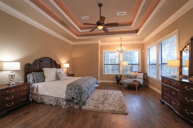 16114 Villa Fontana Way, Houston, TX 77068 - bedroom with a raised ceiling, a chandelier, dark wood finished floors, baseboards, and ornamental molding