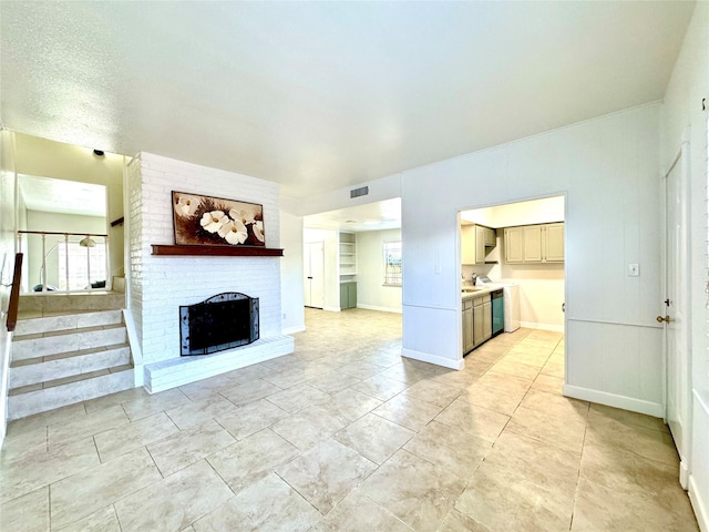 11127 Village Bend Ln Unit 1127, Houston, TX 77072 - unfurnished living room featuring a fireplace