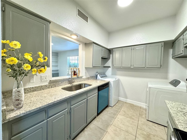 11127 Village Bend Ln Unit 1127, Houston, TX 77072 - kitchen featuring separate washer and dryer, gray cabinets, a sink, and dishwashing machine