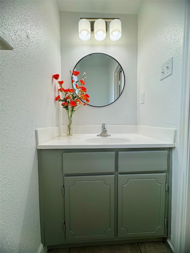11127 Village Bend Ln Unit 1127, Houston, TX 77072 - bathroom featuring vanity and a textured wall