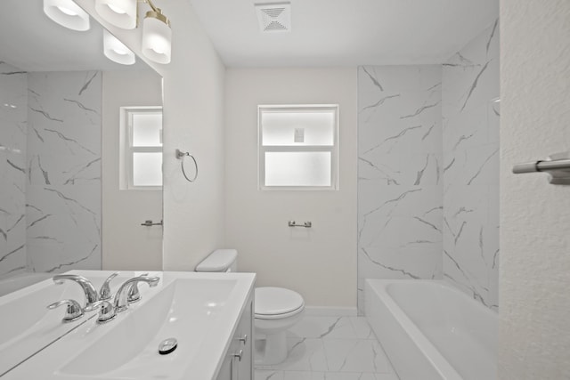5763 Belneath St, Houston, TX 77033 - bathroom with marble finish flooring, toilet, vanity, and washtub / shower combination