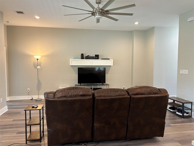 170 Nuuanu Ln, Bastrop, TX 78602 - living area featuring a ceiling fan, wood finished floors, baseboards, and recessed lighting