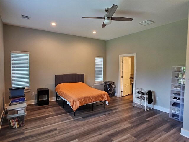 170 Nuuanu Ln, Bastrop, TX 78602 - bedroom with wood finished floors, recessed lighting, baseboards, multiple windows, and a ceiling fan