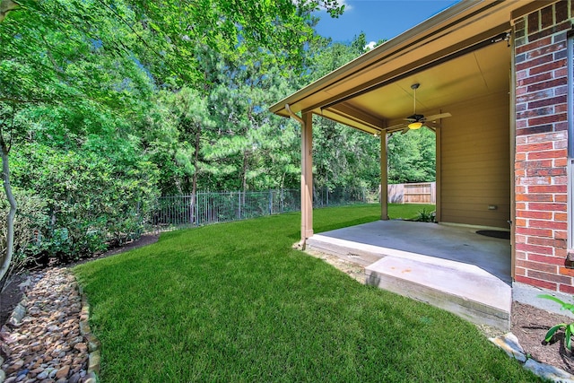 27506 Colin Springs Ln, Spring, TX 77386 - view of yard with ceiling fan and a patio area