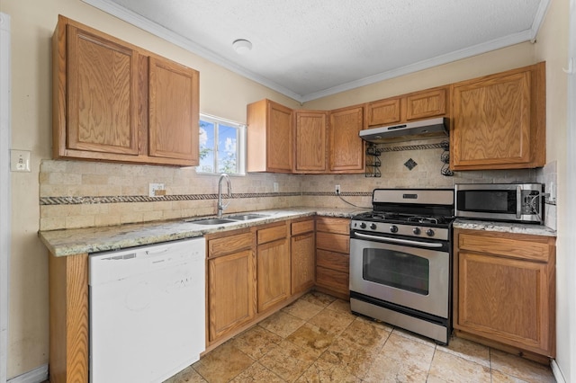 1922 Des Jardines St, Houston, TX 77023 - kitchen featuring appliances with stainless steel finishes, under cabinet range hood, a sink, backsplash, and ornamental molding