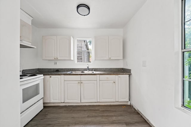 1922 Des Jardines St, Houston, TX 77023 - kitchen with white electric stove, a sink, dark countertops, and white cabinets