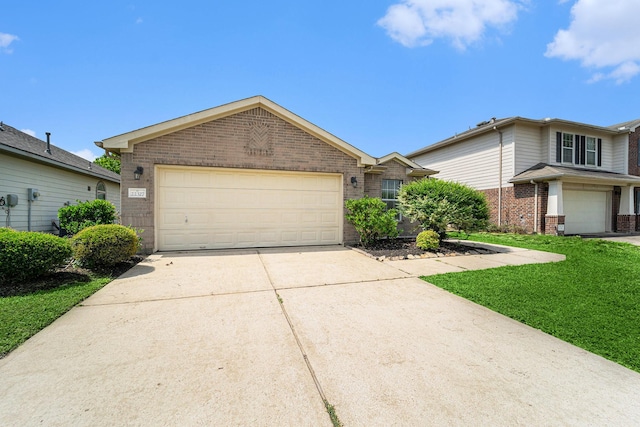 22327 Albee Dr, Katy, TX 77449 - view of front of house featuring brick siding, concrete driveway, an attached garage, and a front lawn