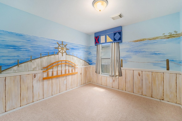 22327 Albee Dr, Katy, TX 77449 - spare room featuring carpet flooring and wood walls