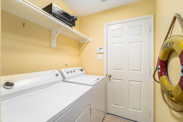 22327 Albee Dr, Katy, TX 77449 - washroom featuring separate washer and dryer and light tile patterned floors