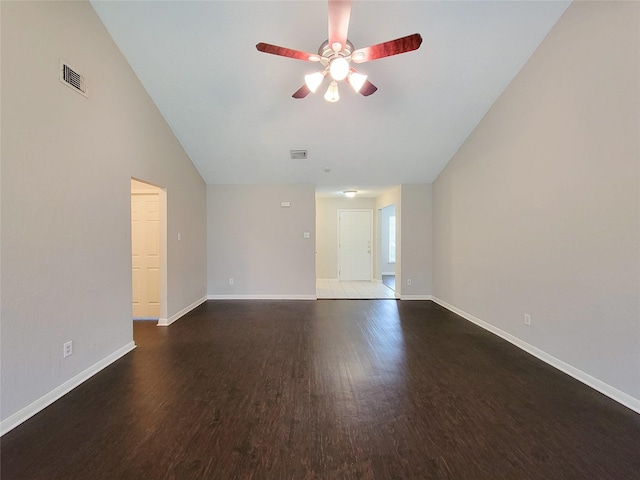 6722 Loch Bruceray Dr, Houston, TX 77084 - unfurnished living room with ceiling fan, wood finished floors, baseboards, and vaulted ceiling