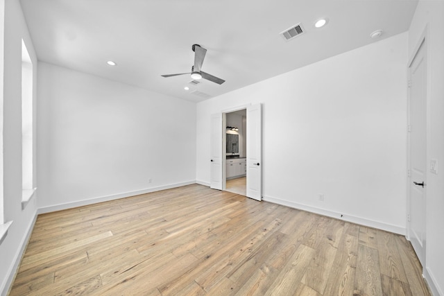1706 Sedola Ln, Houston, TX 77055 - unfurnished bedroom with light wood-style floors, recessed lighting, ensuite bath, baseboards, and a ceiling fan