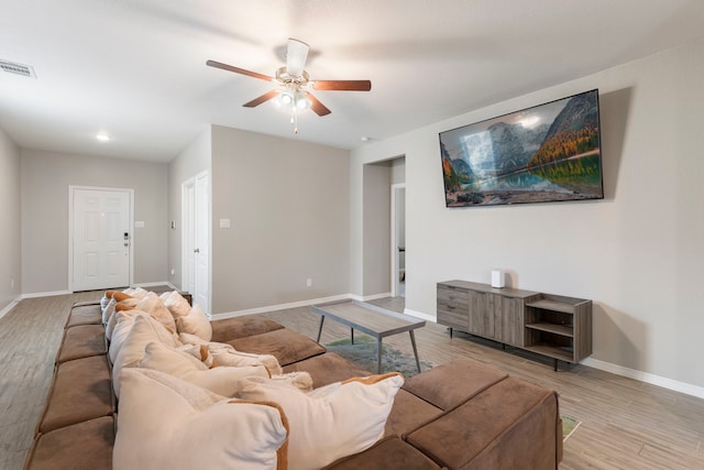 24719 Colony Meadow Trl, Huffman, TX 77336 - living room with ceiling fan, baseboards, and wood finished floors