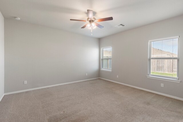24719 Colony Meadow Trl, Huffman, TX 77336 - unfurnished room featuring a ceiling fan, light carpet, baseboards, and a smoke detector