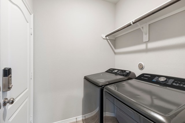 24719 Colony Meadow Trl, Huffman, TX 77336 - washroom with washing machine and clothes dryer