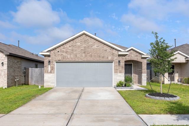 24719 Colony Meadow Trl, Huffman, TX 77336 - view of front of house with brick siding, driveway, and a garage