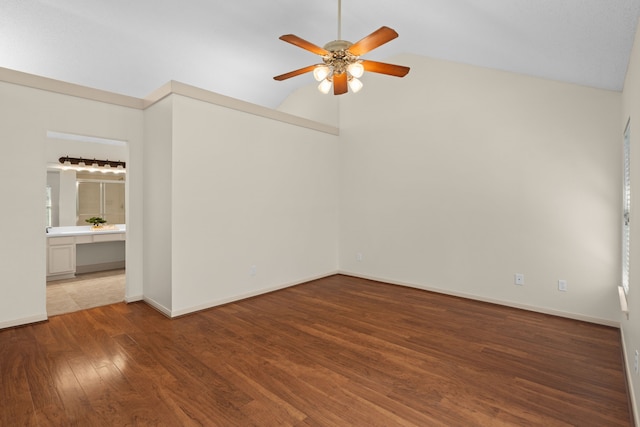 10011 Storm Meadow Dr, Houston, TX 77064 - spare room with ceiling fan, vaulted ceiling, wood finished floors, and baseboards