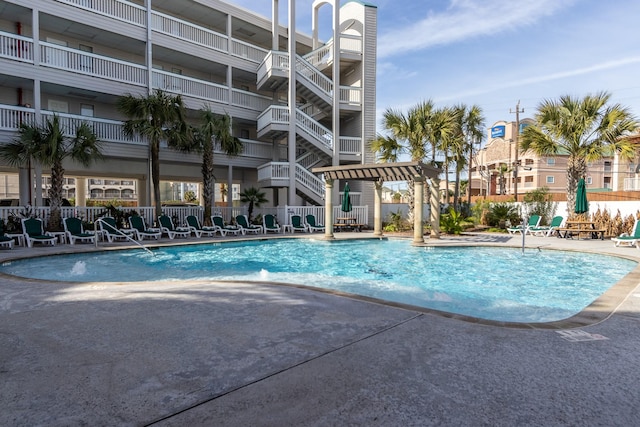 6102 Seawall Blvd Unit 140, Galveston, TX 77551 - community pool featuring fence and a patio