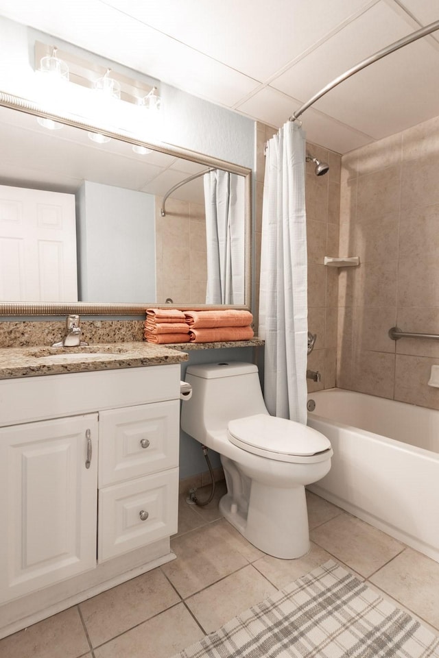 6102 Seawall Blvd Unit 140, Galveston, TX 77551 - full bathroom featuring tile patterned floors, toilet, and shower / tub combo with curtain