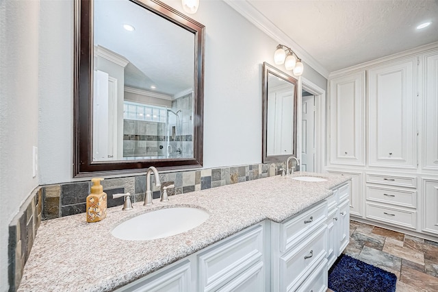 11607 Knobcrest Dr, Houston, TX 77070 - full bathroom featuring ornamental molding, tiled shower, stone tile floors, and double vanity