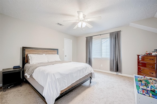 11607 Knobcrest Dr, Houston, TX 77070 - bedroom with baseboards, light colored carpet, a textured ceiling, and a ceiling fan
