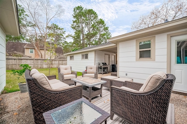 11607 Knobcrest Dr, Houston, TX 77070 - view of patio with an outdoor living space, fence, and area for grilling