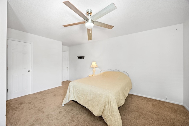 13392 Southshore Dr, Conroe, TX 77304 - bedroom featuring carpet, baseboards, and ceiling fan