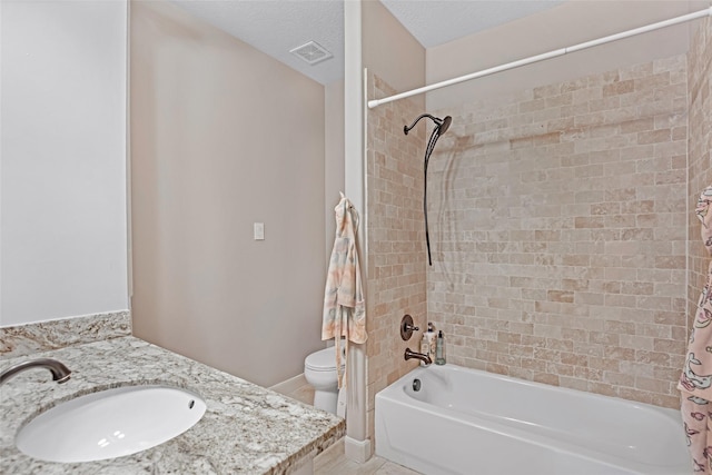 bathroom featuring shower / bathtub combination with curtain, toilet, vanity, and tile patterned flooring