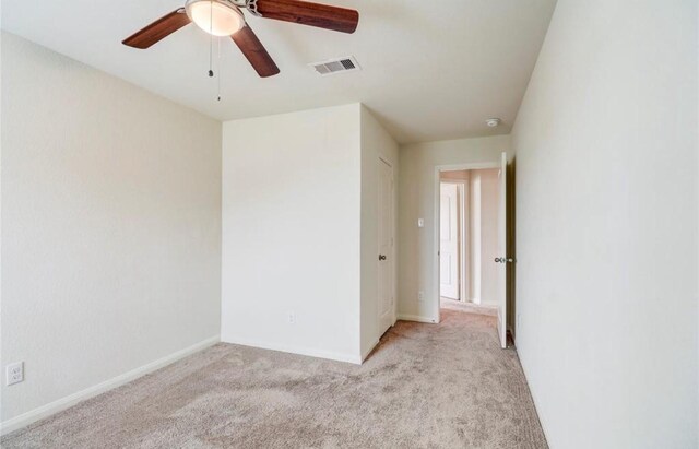 2037 Mule Rdg, Katy, TX 77493 - unfurnished room featuring light carpet, ceiling fan, baseboards, and a smoke detector