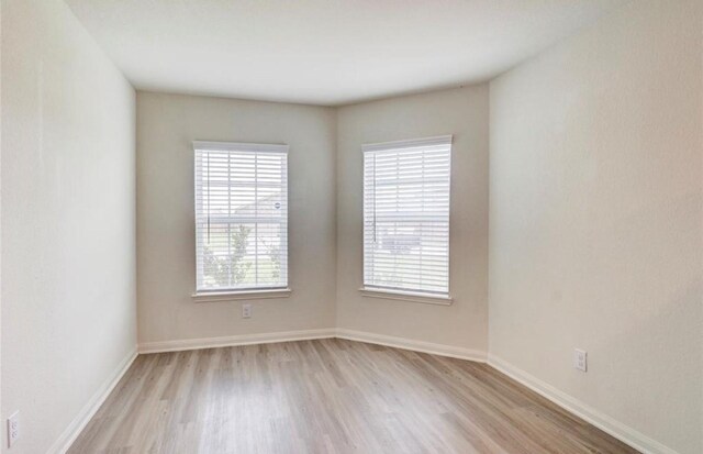 2037 Mule Rdg, Katy, TX 77493 - spare room with light wood-style floors and baseboards