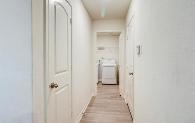 2037 Mule Rdg, Katy, TX 77493 - hall with separate washer and dryer and light wood-style flooring