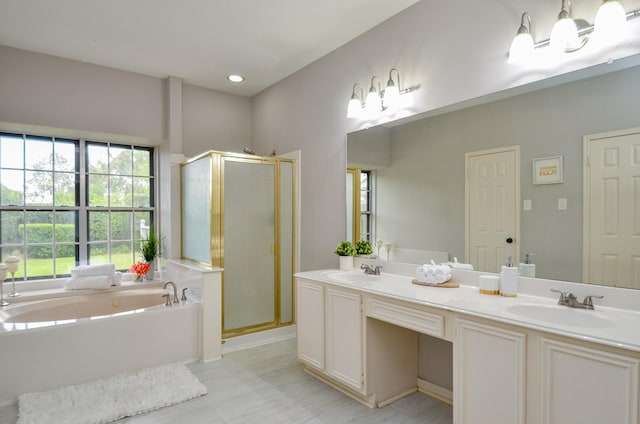 415 Wild Peach Pl, Missouri City, TX 77459 - full bathroom featuring a garden tub, a stall shower, and double vanity