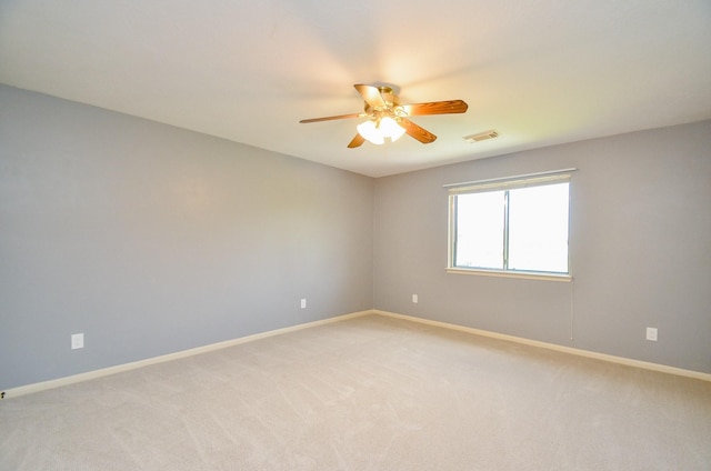 415 Wild Peach Pl, Missouri City, TX 77459 - unfurnished room with a ceiling fan, light colored carpet, and baseboards