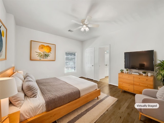 22014 Mission Hills Ln, Katy, TX 77450 - bedroom featuring wood finished floors and a ceiling fan