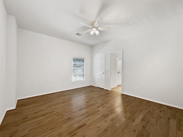 22014 Mission Hills Ln, Katy, TX 77450 - unfurnished room with wood finished floors, baseboards, and a ceiling fan
