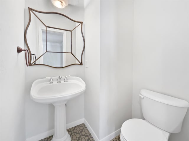 22014 Mission Hills Ln, Katy, TX 77450 - half bathroom featuring toilet and baseboards