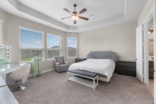 1810 Evergreen Bay Ln, Katy, TX 77494 - carpeted bedroom with a raised ceiling, baseboards, and ceiling fan