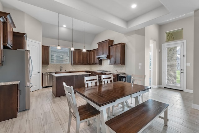 1810 Evergreen Bay Ln, Katy, TX 77494 - dining area featuring vaulted ceiling, baseboards, and recessed lighting