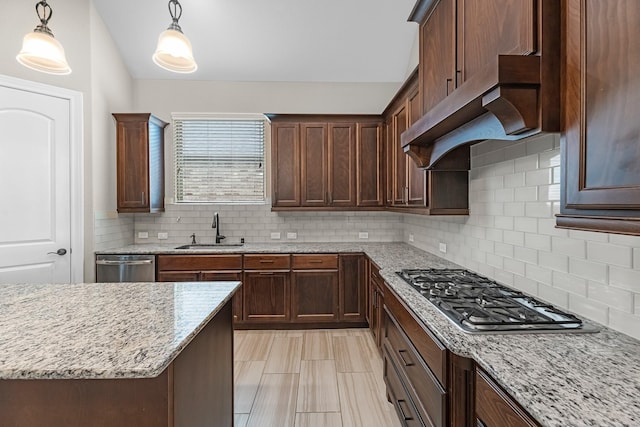 1810 Evergreen Bay Ln, Katy, TX 77494 - kitchen with a sink, stainless steel appliances, light stone countertops, and backsplash
