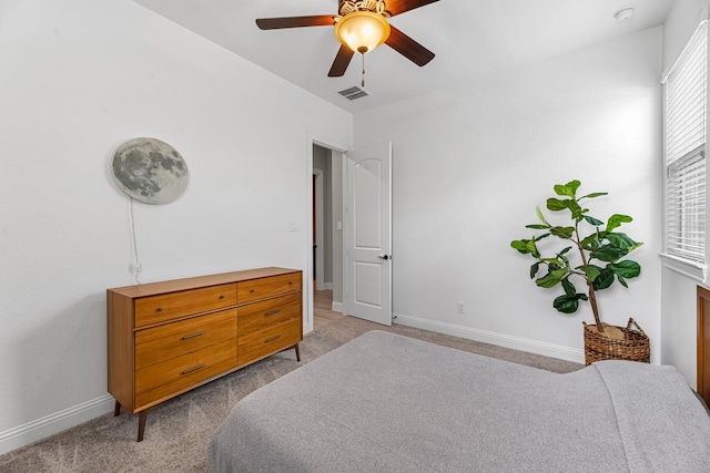 1810 Evergreen Bay Ln, Katy, TX 77494 - bedroom with light carpet, baseboards, and a ceiling fan