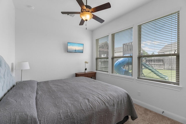 1810 Evergreen Bay Ln, Katy, TX 77494 - carpeted bedroom featuring baseboards and a ceiling fan