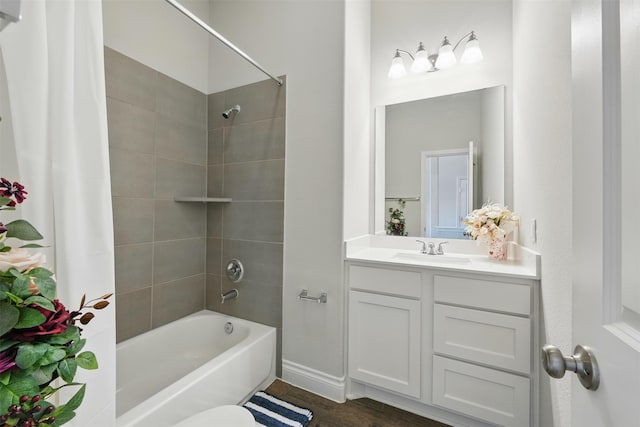 1722 Country Air Ln, Missouri City, TX 77459 - full bath featuring shower / tub combo with curtain, vanity, and wood finished floors