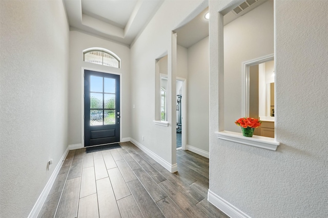 1722 Country Air Ln, Missouri City, TX 77459 - entrance foyer featuring wood finished floors, a textured wall, and baseboards