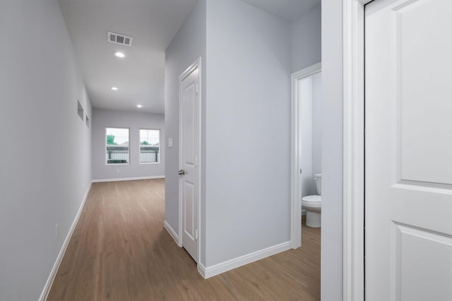 18830 Elegance Ave, Spring, TX 77379 - hallway with wood finished floors, recessed lighting, and baseboards