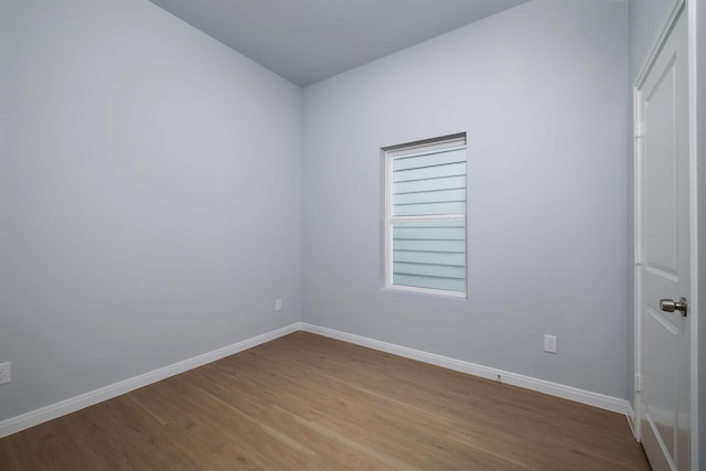 18830 Elegance Ave, Spring, TX 77379 - spare room with wood finished floors and baseboards