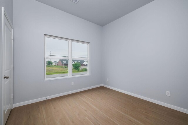 18830 Elegance Ave, Spring, TX 77379 - spare room featuring light wood-style flooring and baseboards