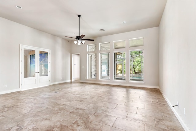 23335 Robinson Pond Dr, New Caney, TX 77357 - unfurnished room with french doors, ceiling fan, baseboards, and recessed lighting