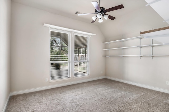 23335 Robinson Pond Dr, New Caney, TX 77357 - carpeted spare room featuring vaulted ceiling, a ceiling fan, and baseboards
