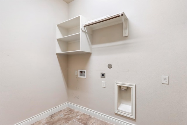23335 Robinson Pond Dr, New Caney, TX 77357 - clothes washing area with hookup for an electric dryer, washer hookup, baseboards, gas dryer hookup, and light tile patterned flooring