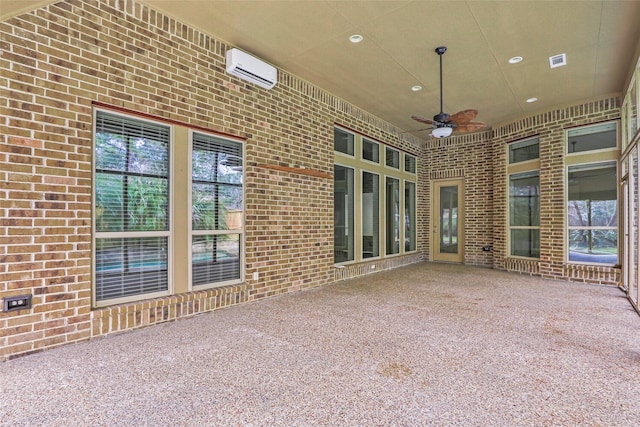 23335 Robinson Pond Dr, New Caney, TX 77357 - view of patio with a ceiling fan and an AC wall unit